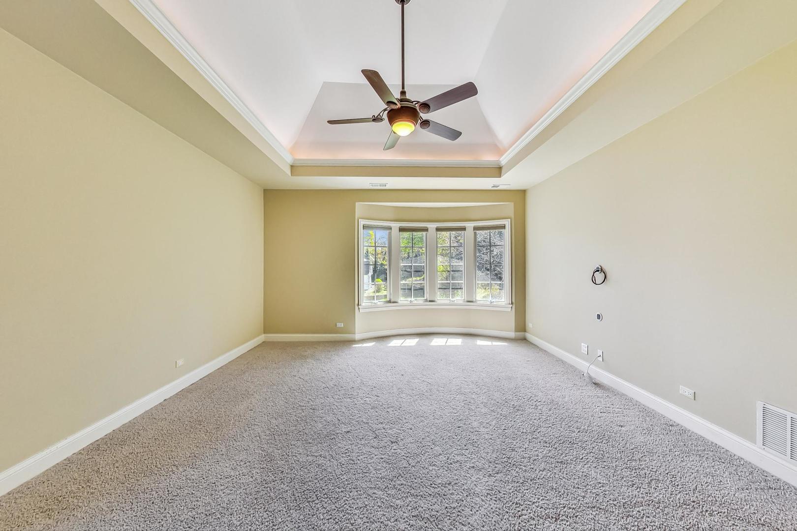 136 Fuller Road Hinsdale, IL 60521 - Photo 18 of 53 a view of an empty room with a window