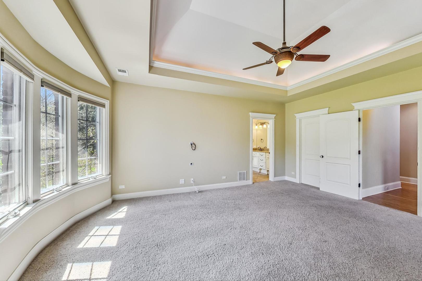 136 Fuller Road Hinsdale, IL 60521 - Photo 19 of 53 a view of an empty room with a window