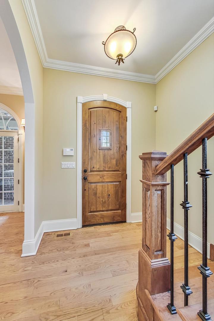 136 Fuller Road Hinsdale, IL 60521 - Photo 2 of 53 a view of an entryway with wooden floor
