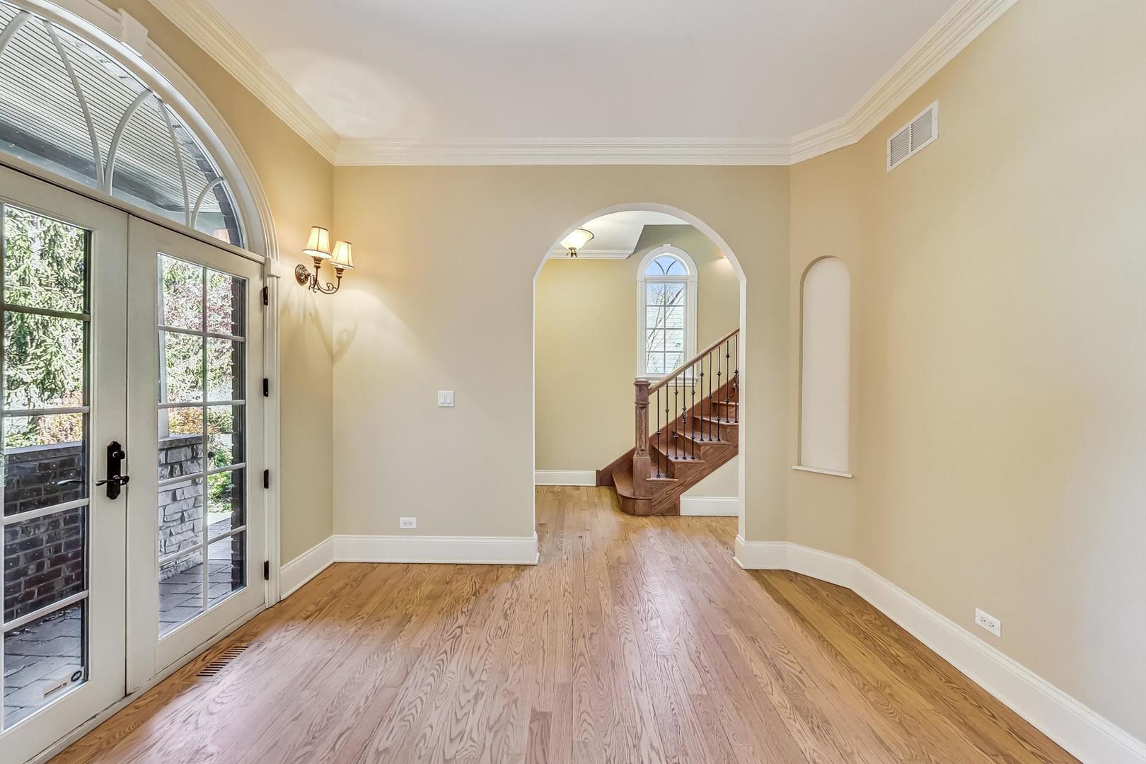 136 Fuller Road Hinsdale, IL 60521 - Photo 3 of 53 a view of an entryway with wooden floor