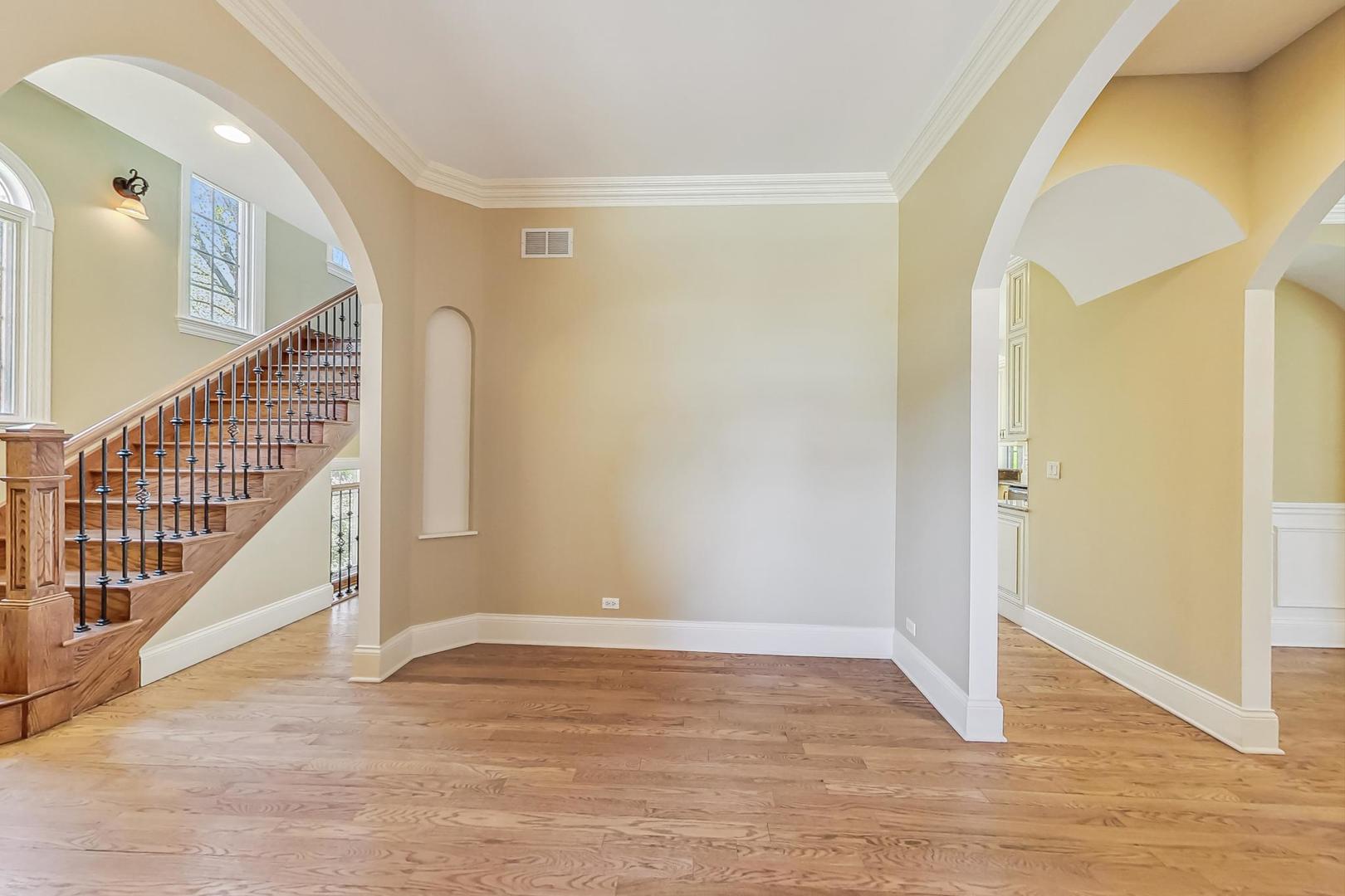 136 Fuller Road Hinsdale, IL 60521 - Photo 4 of 53 a view of an entryway with wooden floor
