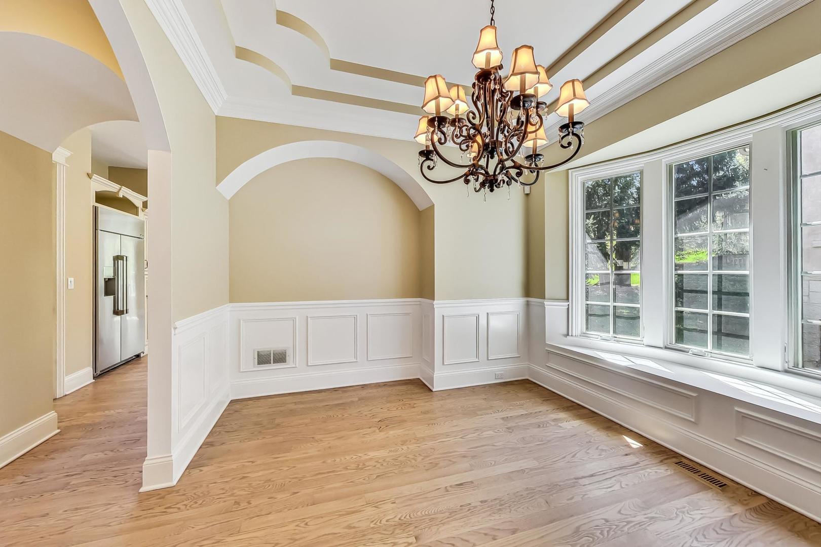 136 Fuller Road Hinsdale, IL 60521 - Photo 7 of 53 a view of entryway with window and wooden floor