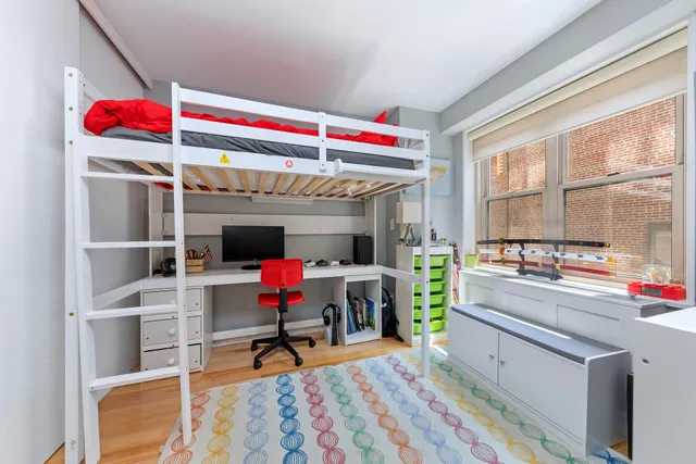 a living room with a couch and a table