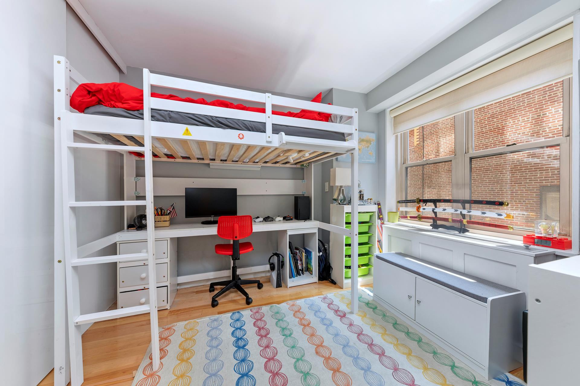 137 East 36th Street, Unit 5B Manhattan, NY 10016 - Photo 11 of 30 a living room with a couch and a table