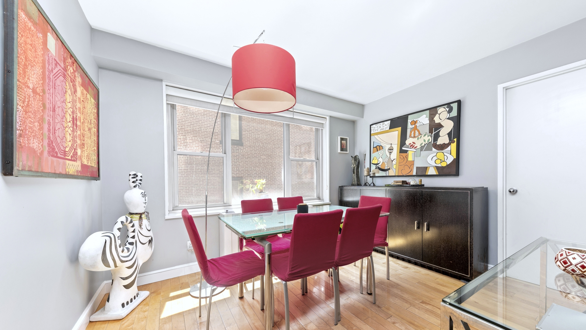 137 East 36th Street, Unit 5B Manhattan, NY 10016 - Photo 4 of 30 a view of a dining room with furniture window and outside view