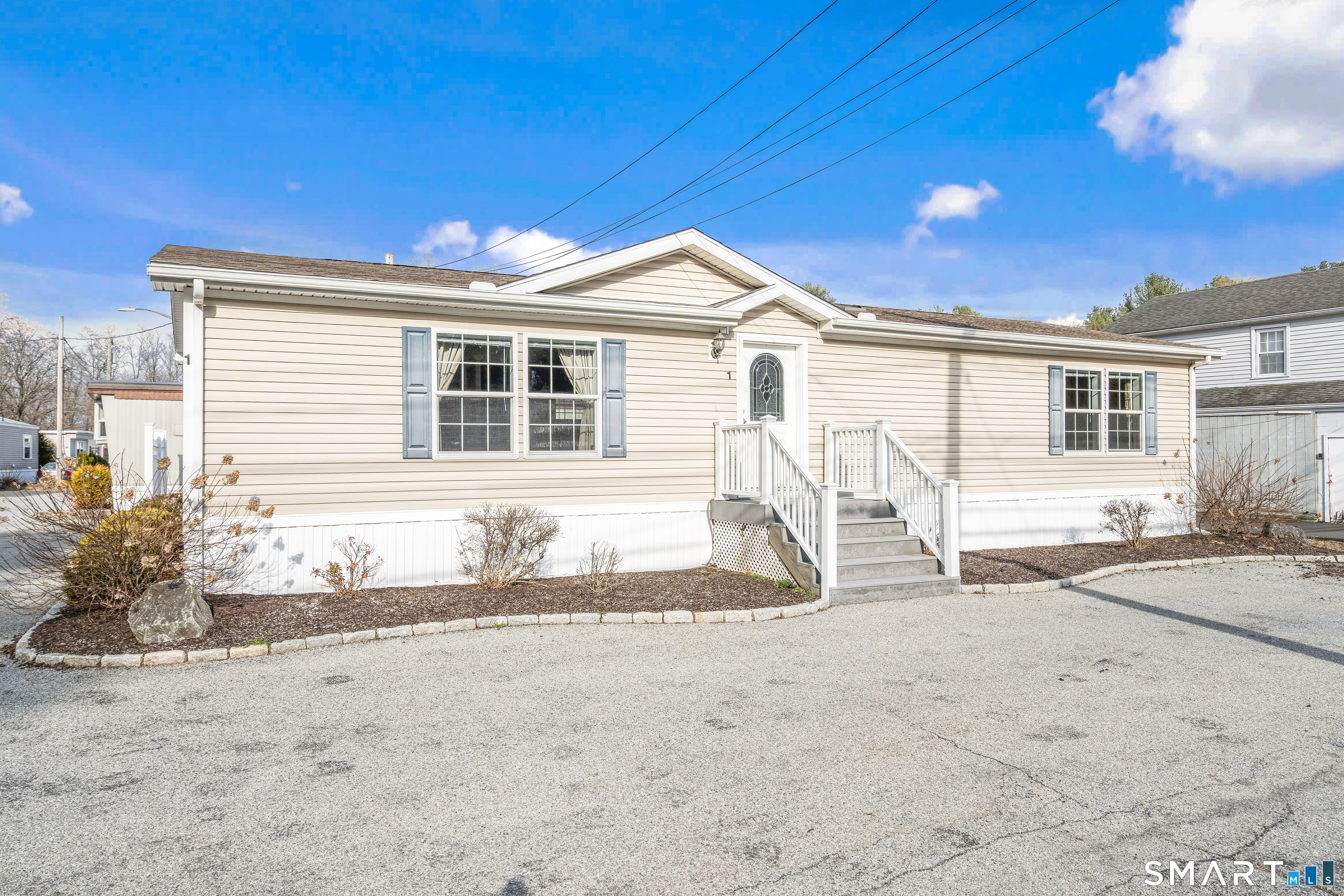 301 South Main Street Newtown, CT 06470 - Photo 1 of 23 a front view of a house with a patio