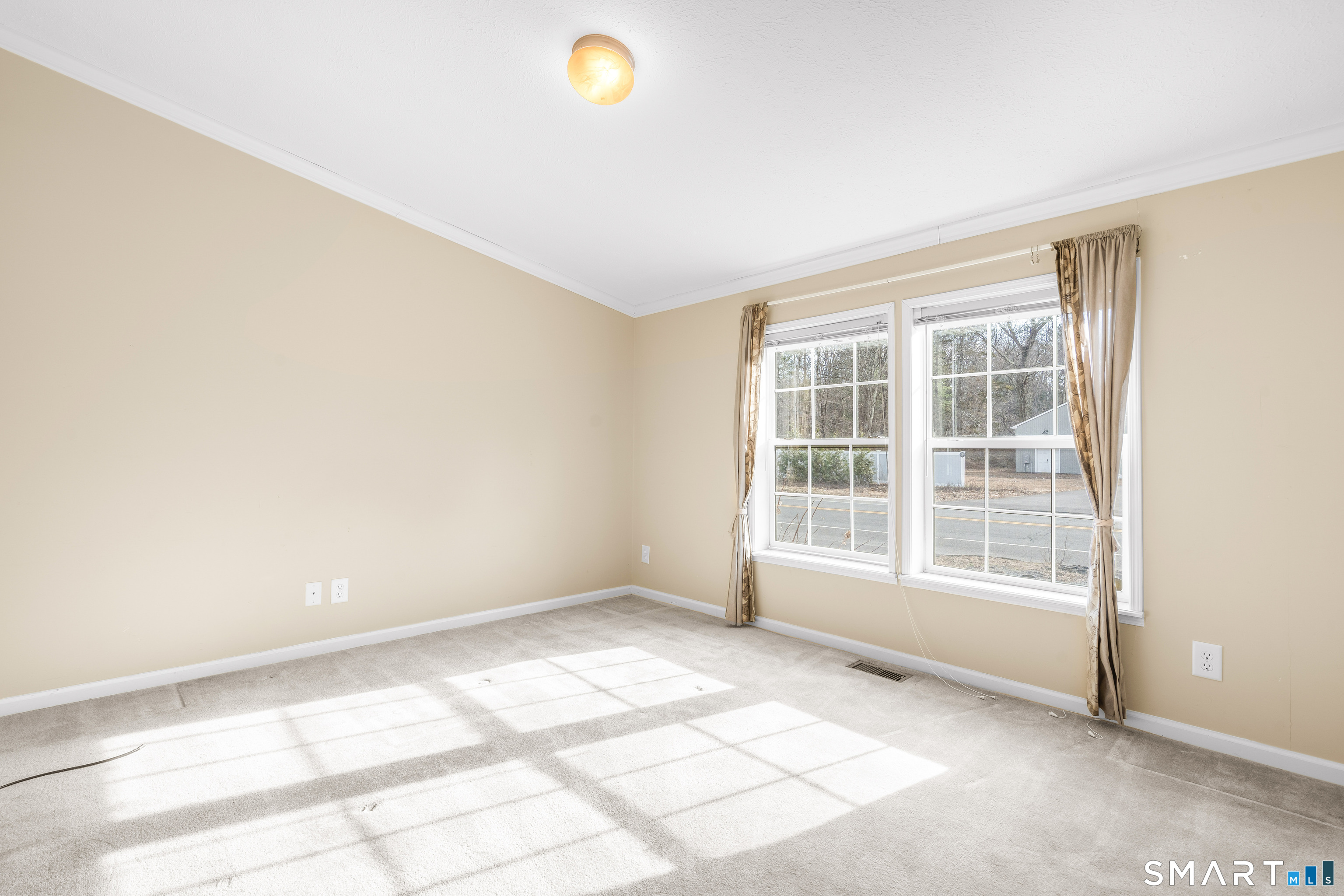 301 South Main Street Newtown, CT 06470 - Photo 18 of 23 a view of an empty room with a window