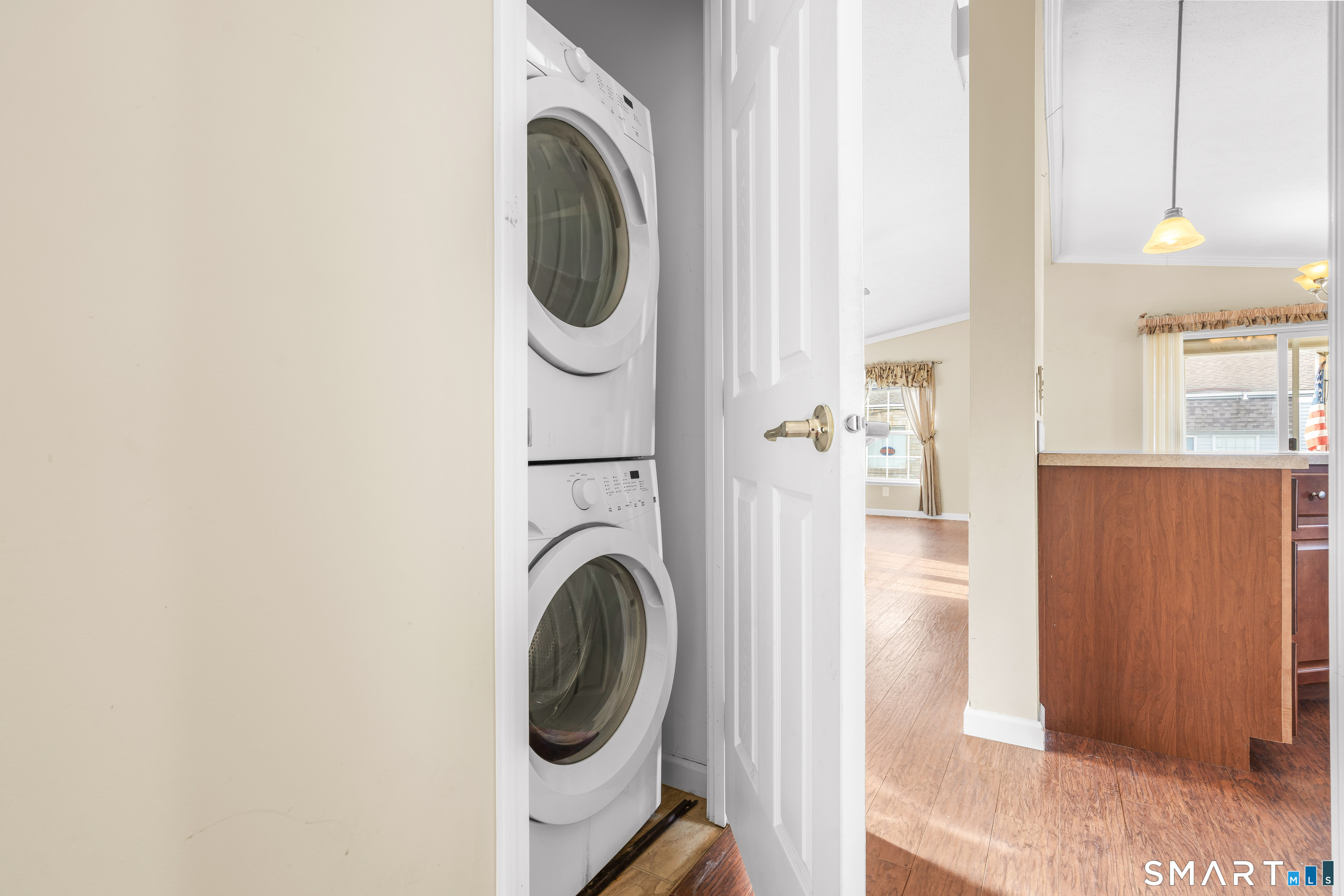 301 South Main Street Newtown, CT 06470 - Photo 19 of 23 a view of a hallway with washer and dryer