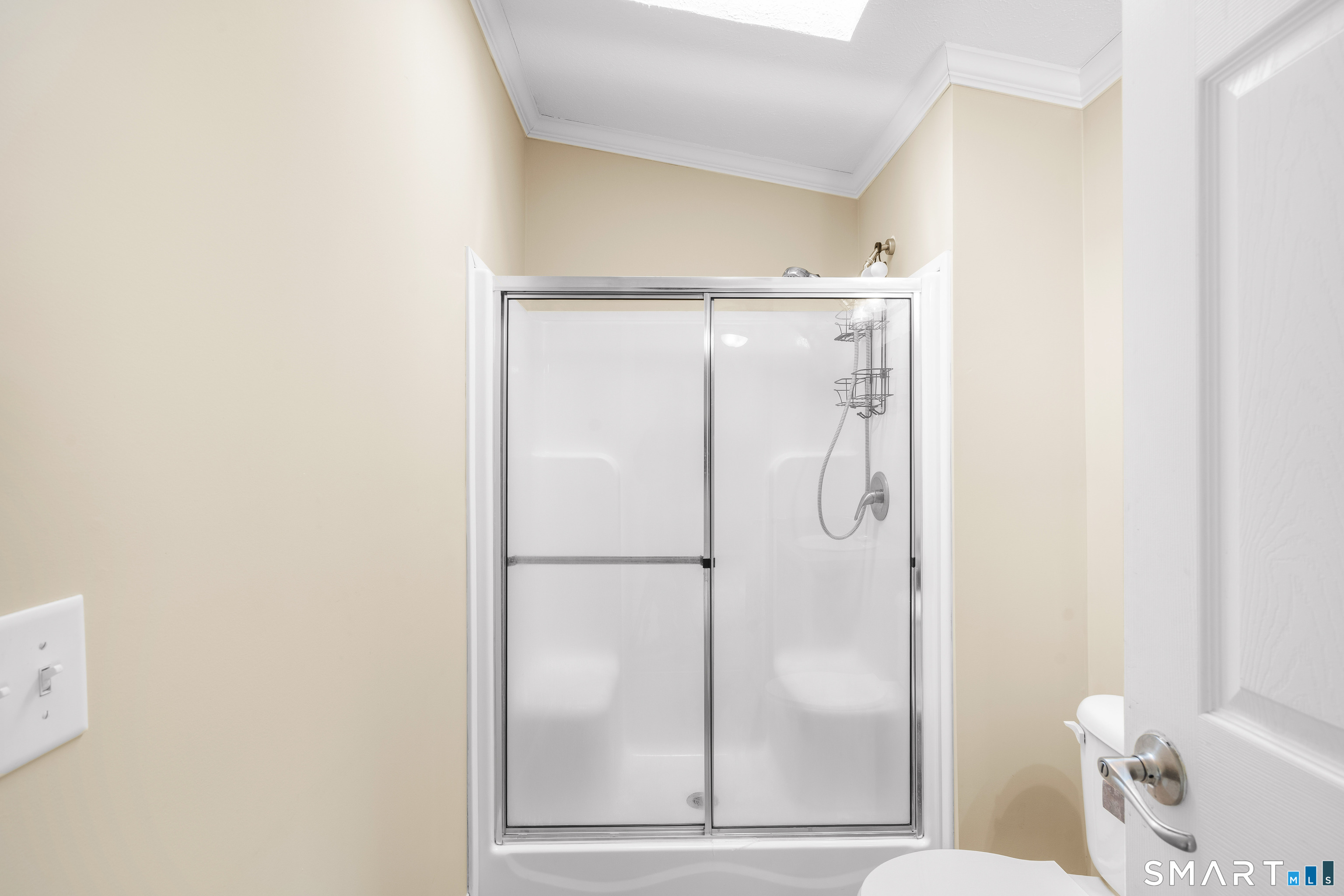 301 South Main Street Newtown, CT 06470 - Photo 20 of 23 a bathroom with a glass shower door