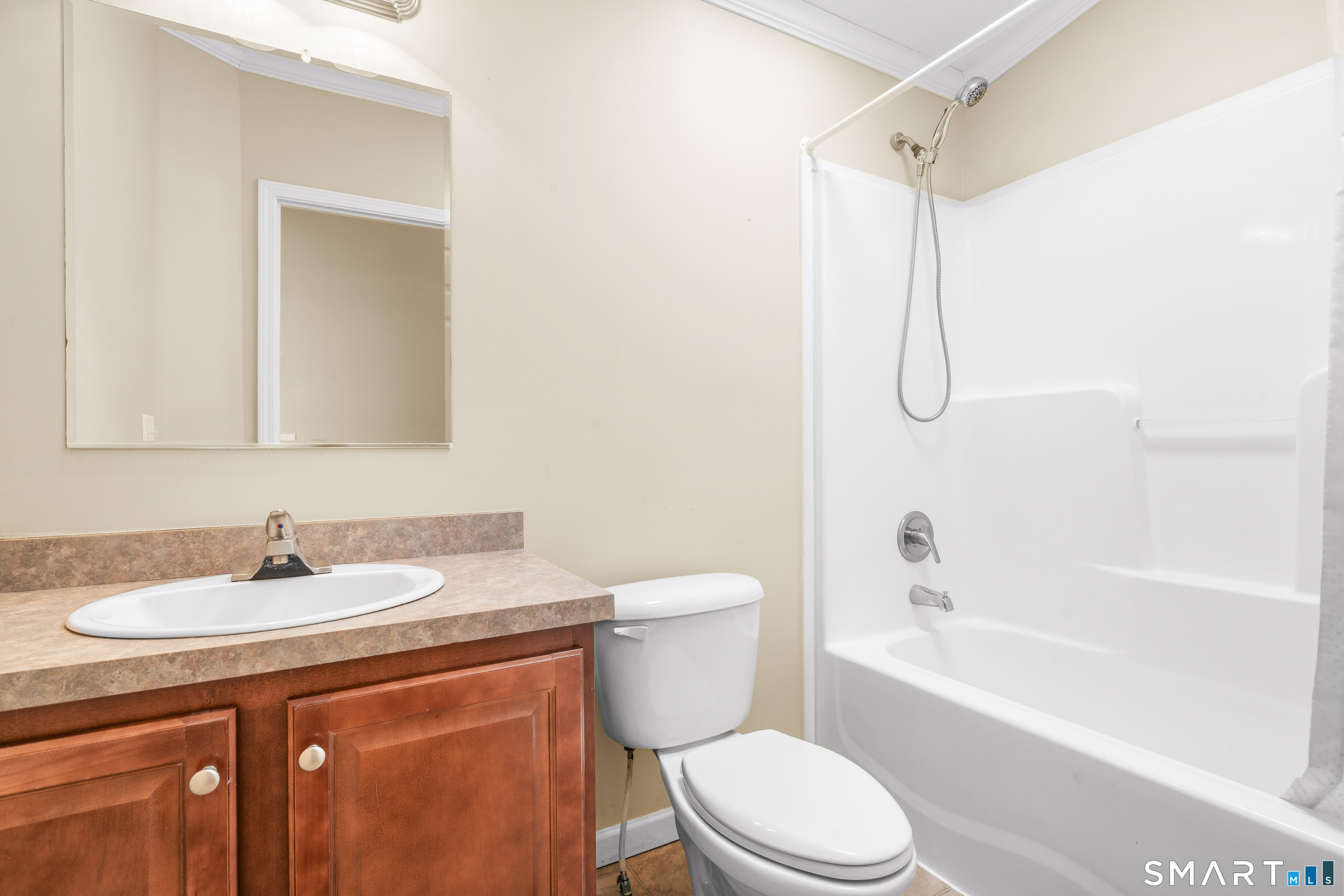 301 South Main Street Newtown, CT 06470 - Photo 22 of 23 a bathroom with a sink toilet and shower