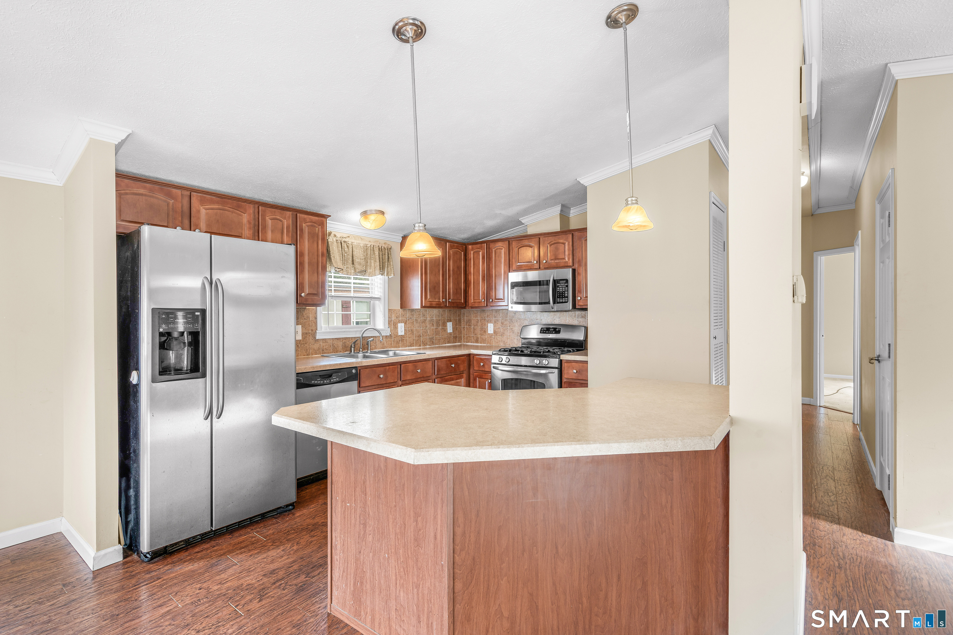 301 South Main Street Newtown, CT 06470 - Photo 10 of 23 a kitchen with stainless steel appliances granite countertop a refrigerator a oven and a sink