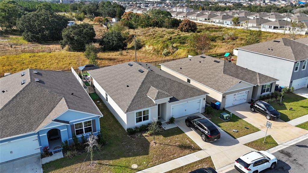 1724 Buckeye Road Davenport, FL 33837 - Photo 26 of 53 an aerial view of a house with a ocean view