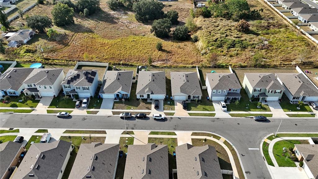 1724 Buckeye Road Davenport, FL 33837 - Photo 29 of 53 an aerial view of a swimming pool