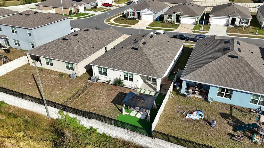 1724 Buckeye Road Davenport, FL 33837 - Photo 3 of 53 an aerial view of a house with a swimming pool