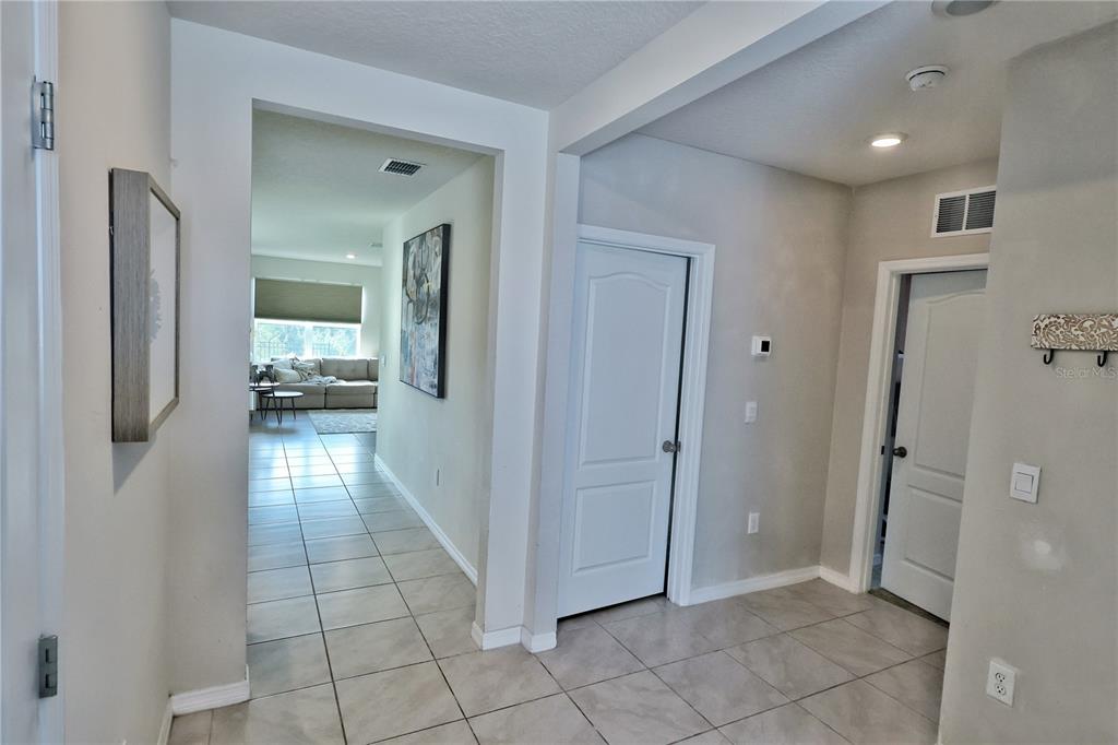 1724 Buckeye Road Davenport, FL 33837 - Photo 40 of 53 a view of a hallway view with staircase