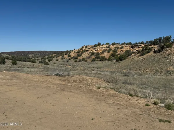 a view of beach and mountains