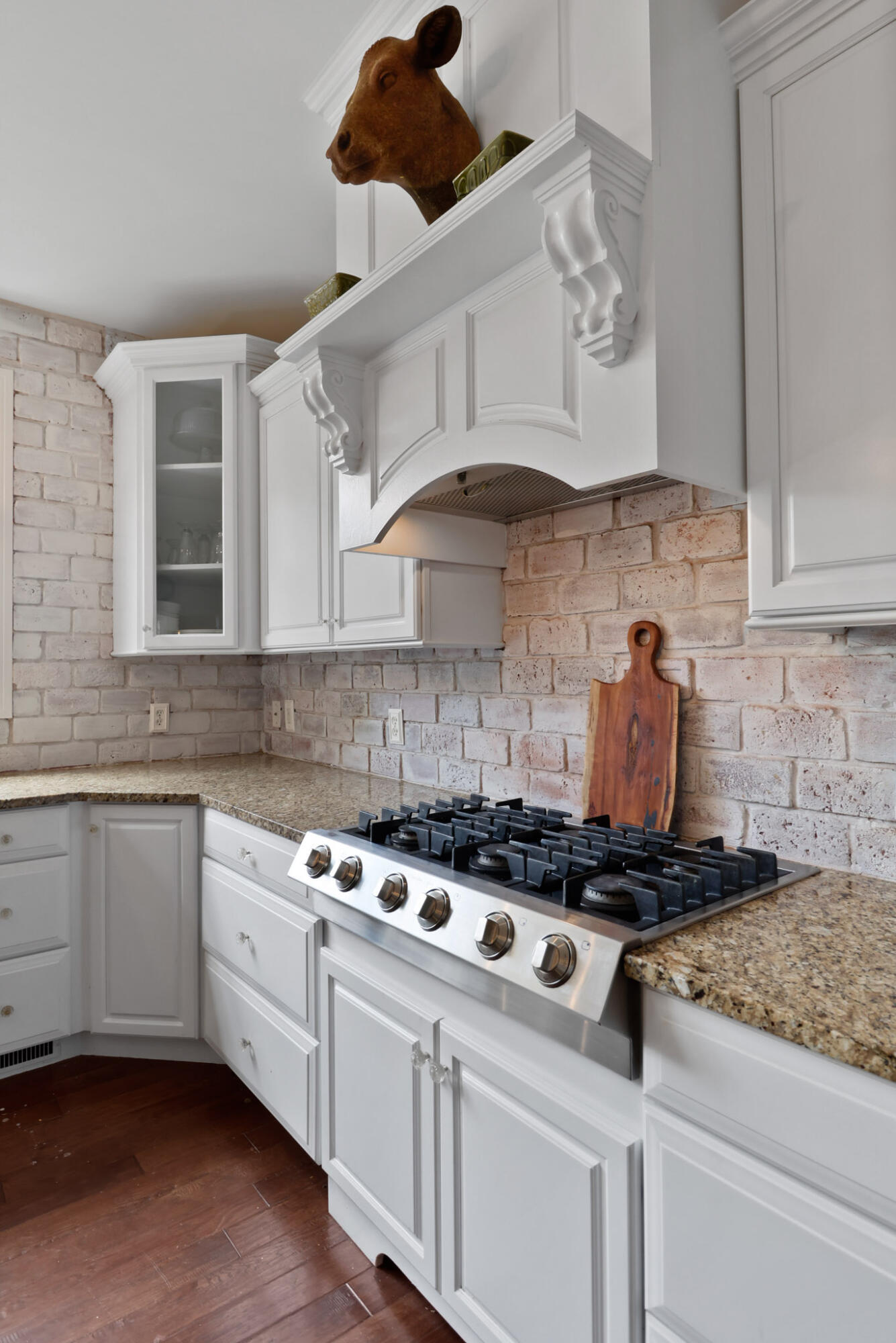 709 Pennock Circle Crown Point, IN 46307 - Photo 12 of 67 a kitchen with stainless steel appliances granite countertop a stove a sink and white cabinets