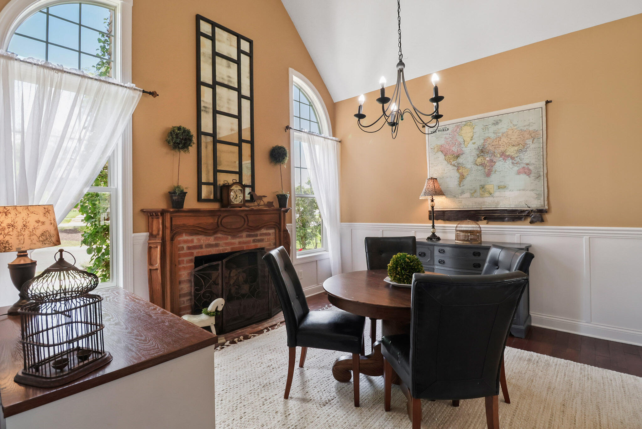 709 Pennock Circle Crown Point, IN 46307 - Photo 20 of 67 a view of a dining room with furniture window and wooden floor