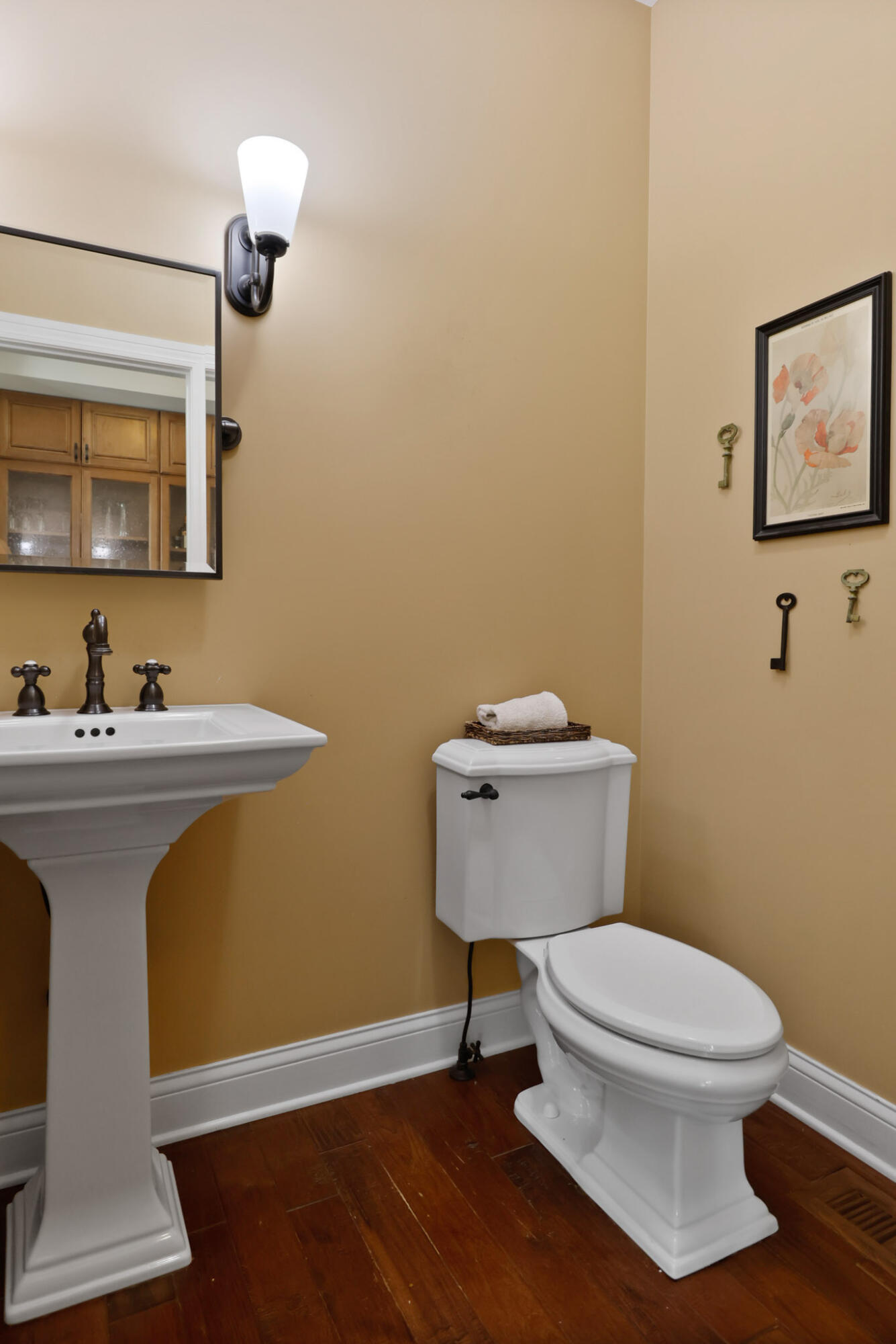 709 Pennock Circle Crown Point, IN 46307 - Photo 34 of 67 a bathroom with a toilet a sink and mirror