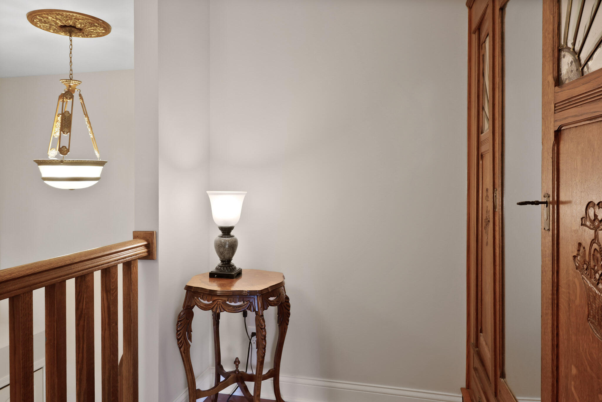 709 Pennock Circle Crown Point, IN 46307 - Photo 42 of 67 a view of a hallway with a table and a chandelier