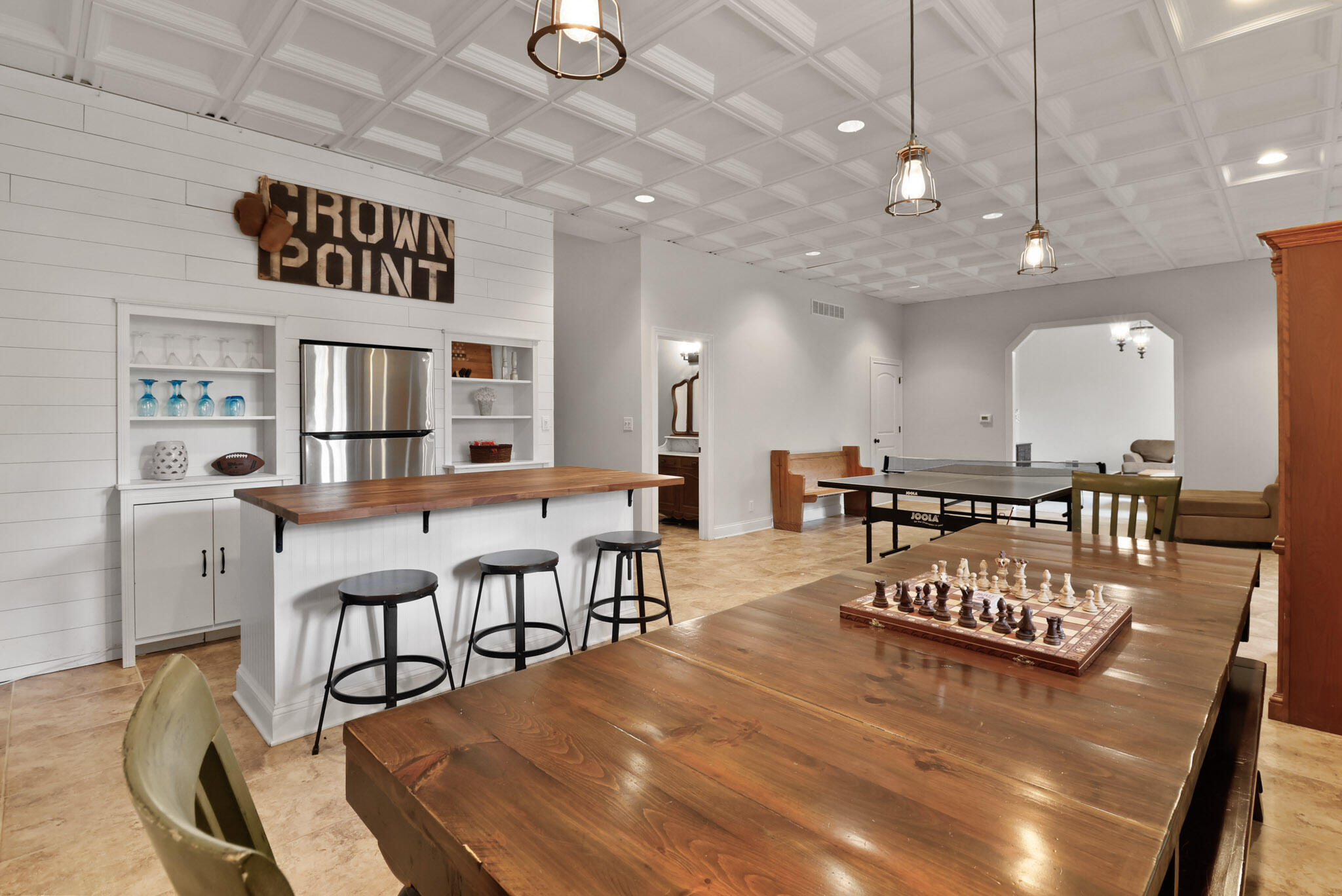 709 Pennock Circle Crown Point, IN 46307 - Photo 46 of 67 a view of a dining room with furniture and a chandelier
