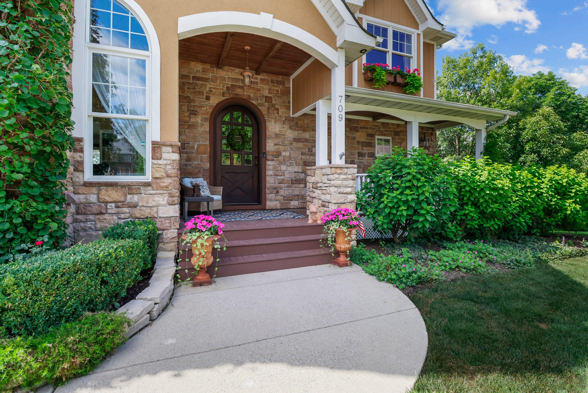 709 Pennock Circle Crown Point, IN 46307 - Photo 5 of 67 a house view with a outdoor space