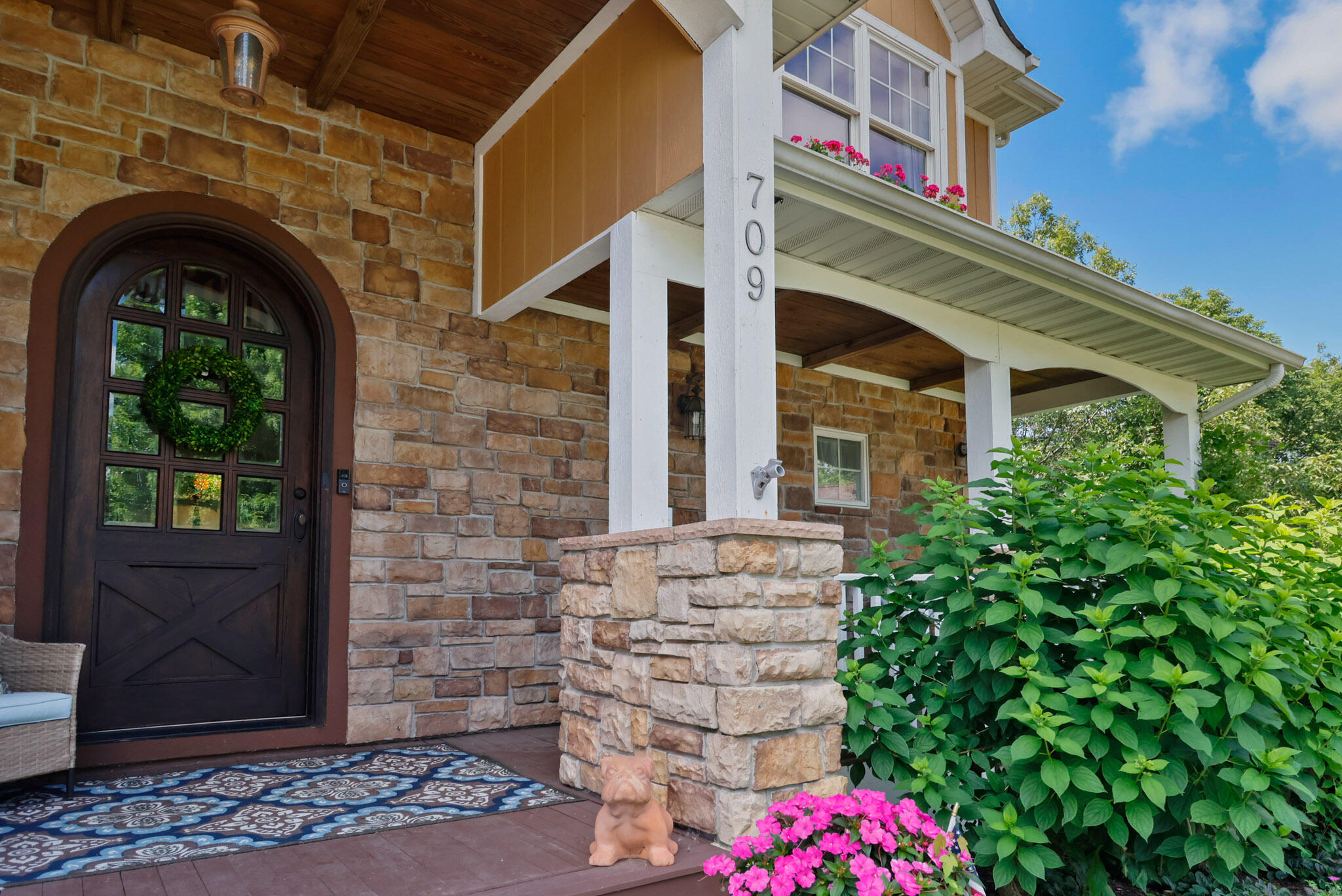 709 Pennock Circle Crown Point, IN 46307 - Photo 6 of 67 a front view of a house with plants