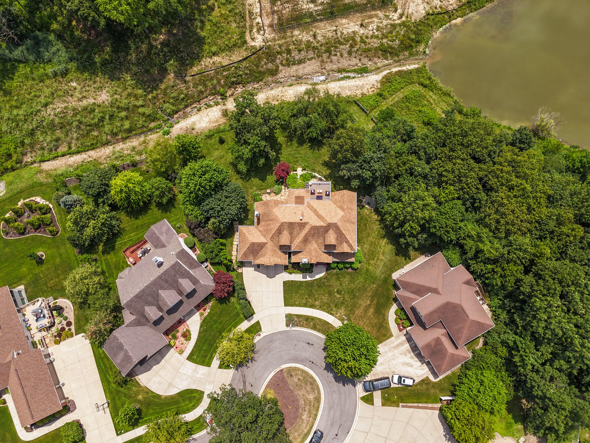 709 Pennock Circle Crown Point, IN 46307 - Photo 66 of 67 an aerial view of a house with yard swimming pool and outdoor seating