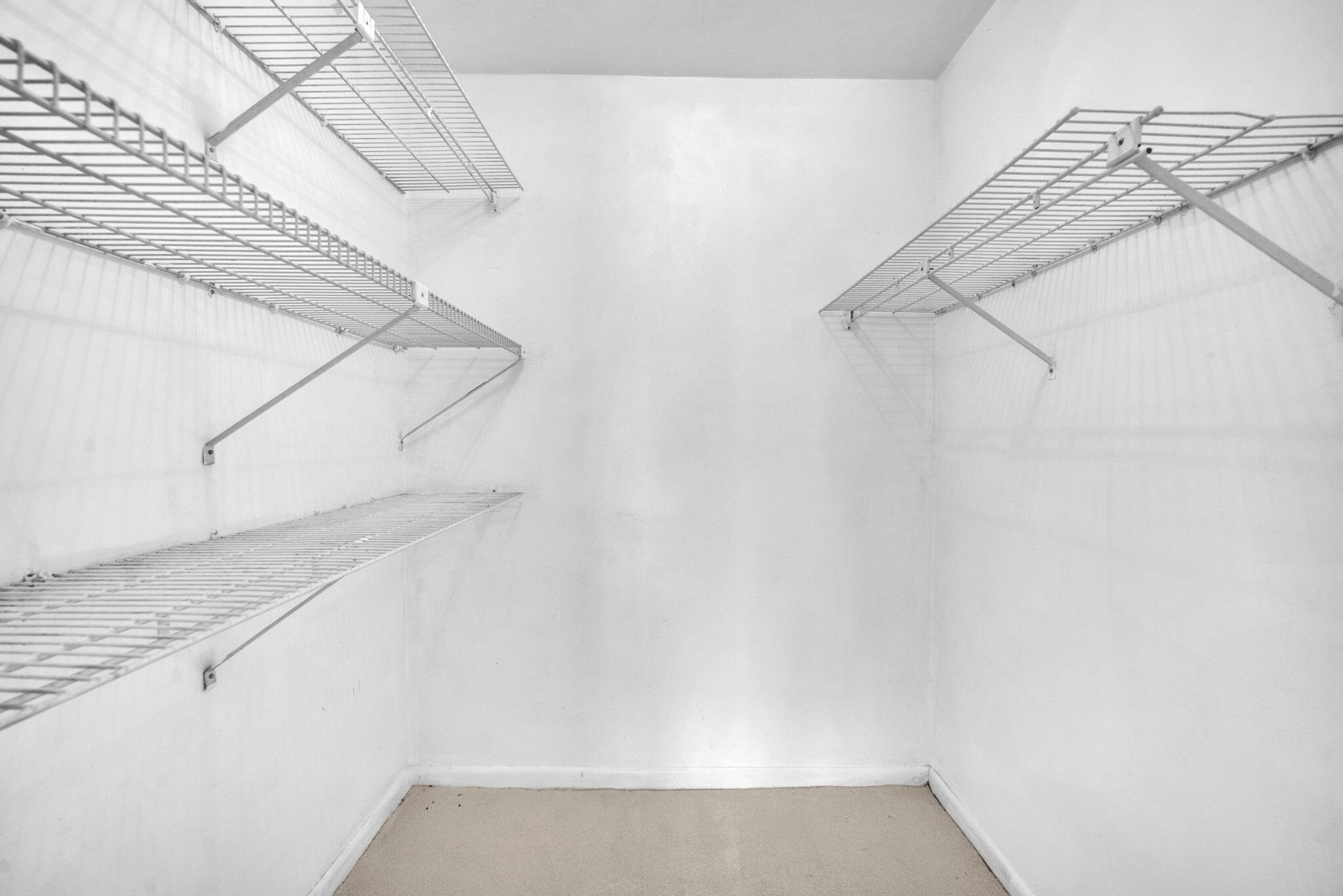 6794 Giralda Circle Boca Raton, FL 33433 - Photo 16 of 49 a view of a walk in closet