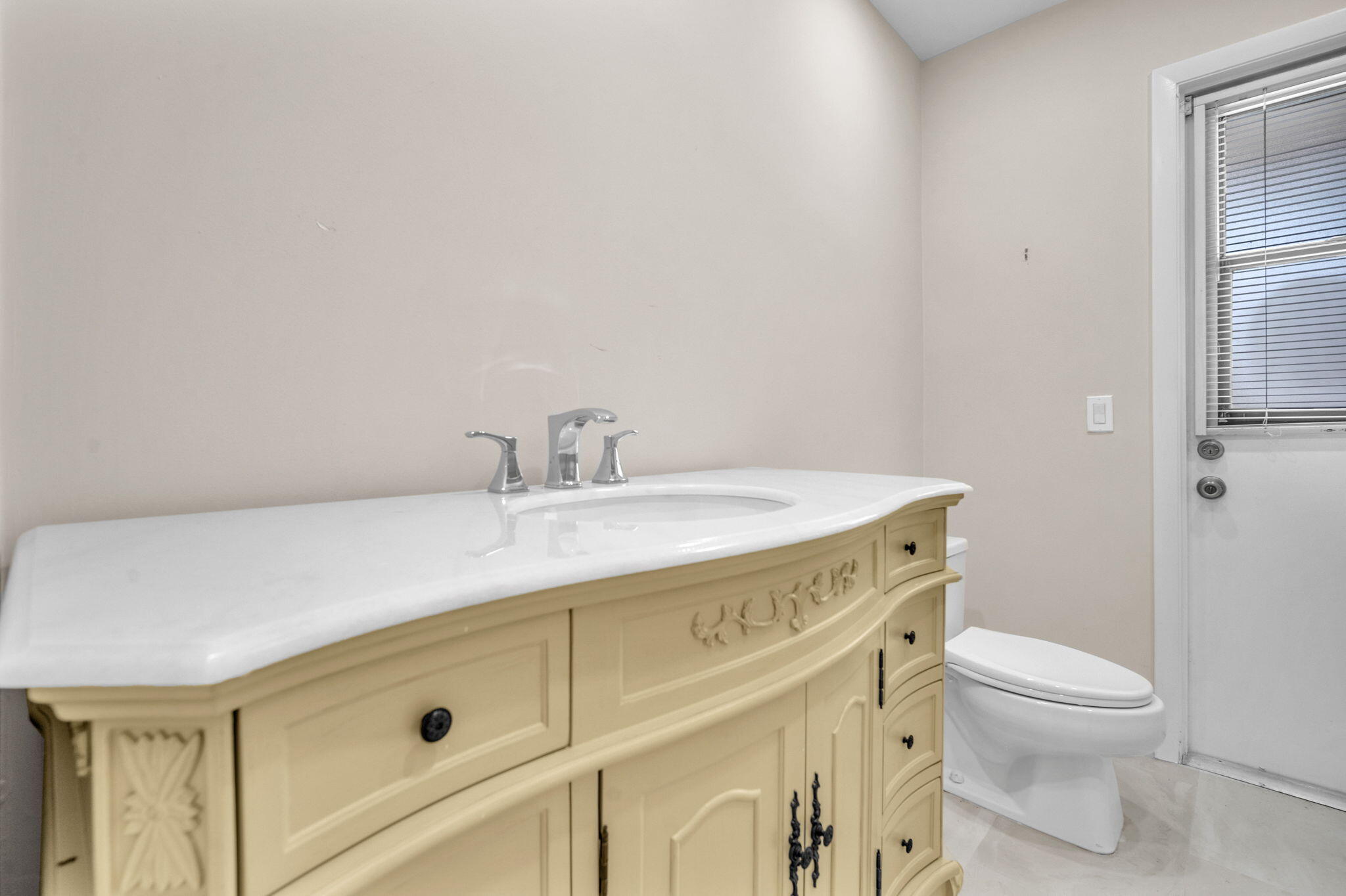 6794 Giralda Circle Boca Raton, FL 33433 - Photo 18 of 49 a bathroom with a sink a toilet and shower