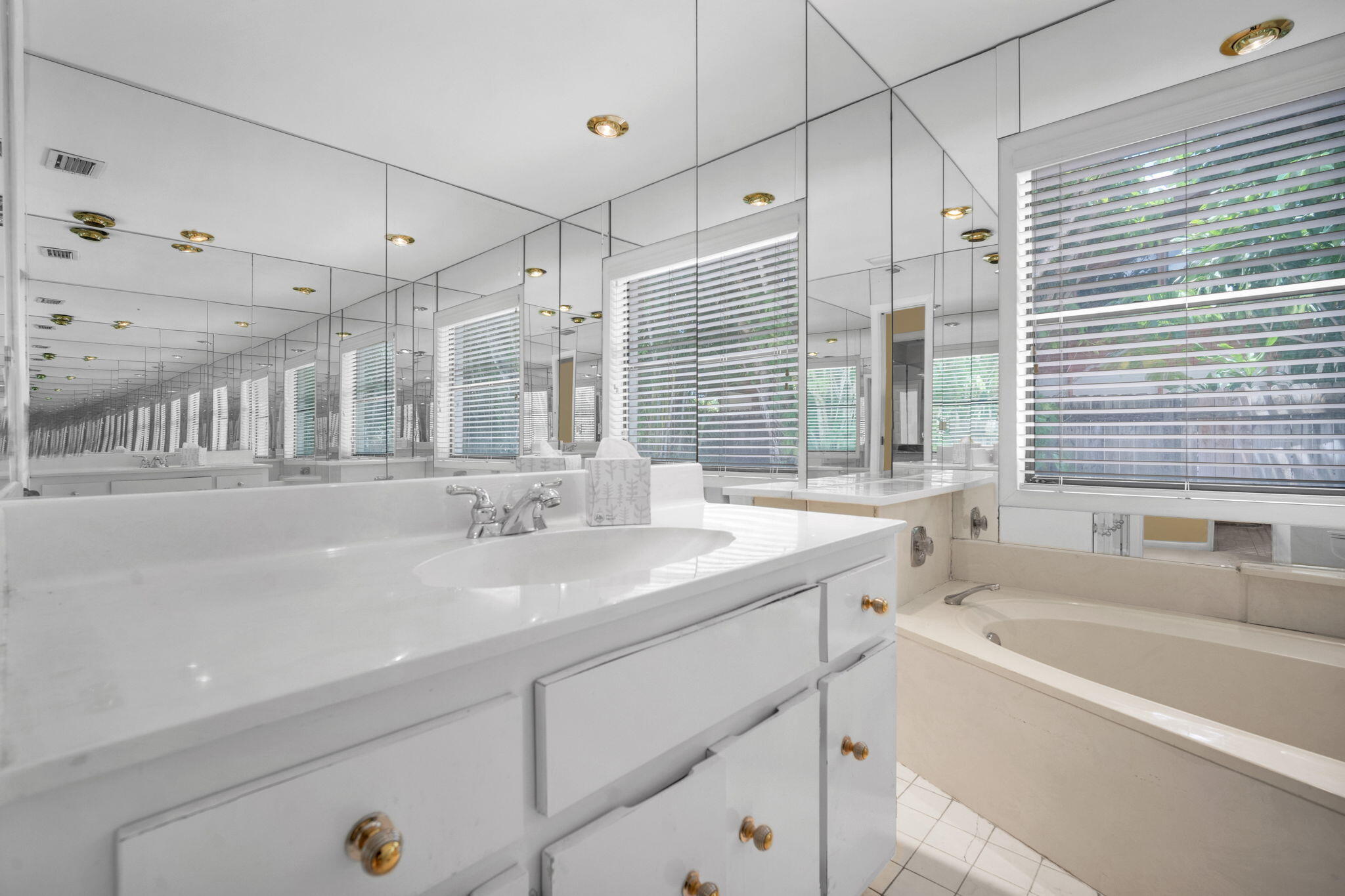 6794 Giralda Circle Boca Raton, FL 33433 - Photo 20 of 49 a bathroom with a granite countertop sink mirror and a bathtub