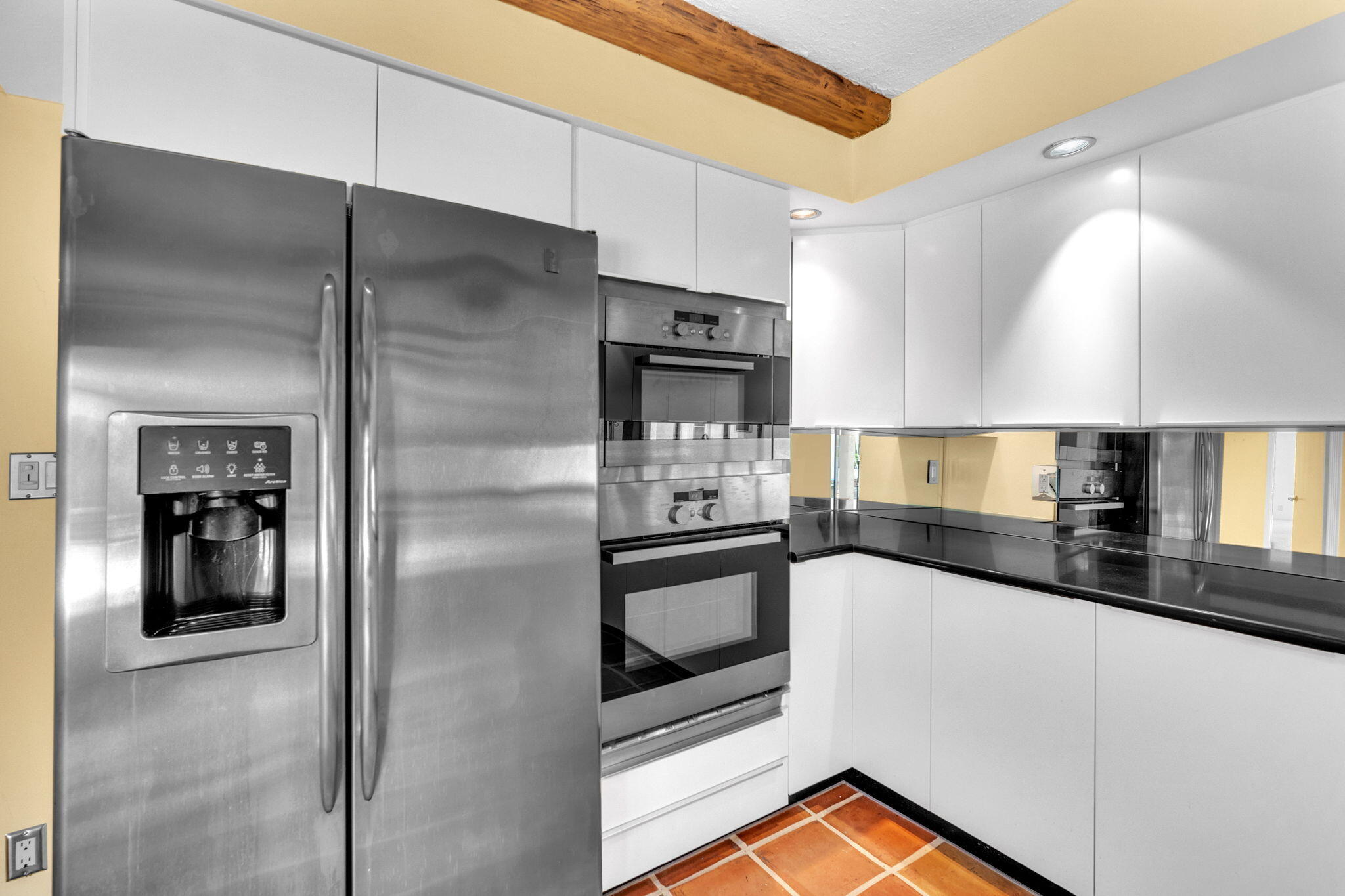 6794 Giralda Circle Boca Raton, FL 33433 - Photo 36 of 49 a kitchen with stainless steel appliances granite countertop a refrigerator and a sink