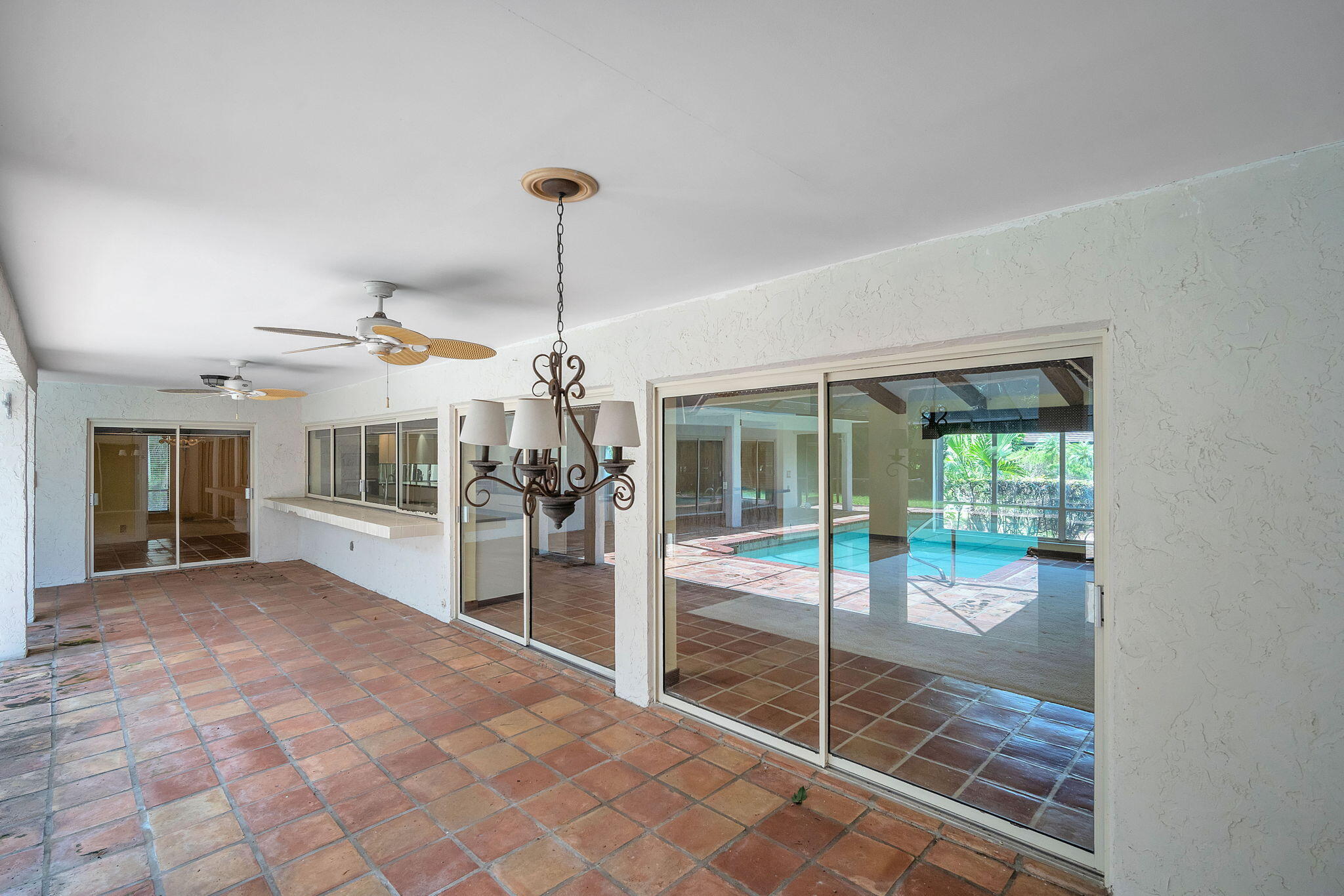6794 Giralda Circle Boca Raton, FL 33433 - Photo 38 of 49 a view of a living room and chandelier