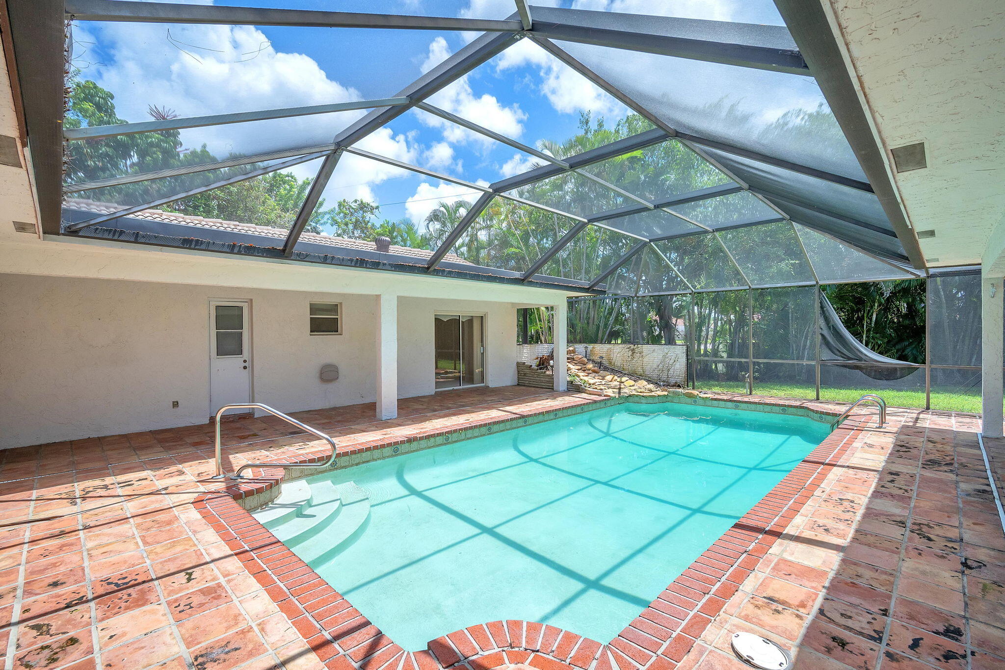 6794 Giralda Circle Boca Raton, FL 33433 - Photo 40 of 49 a backyard of a house with seating space