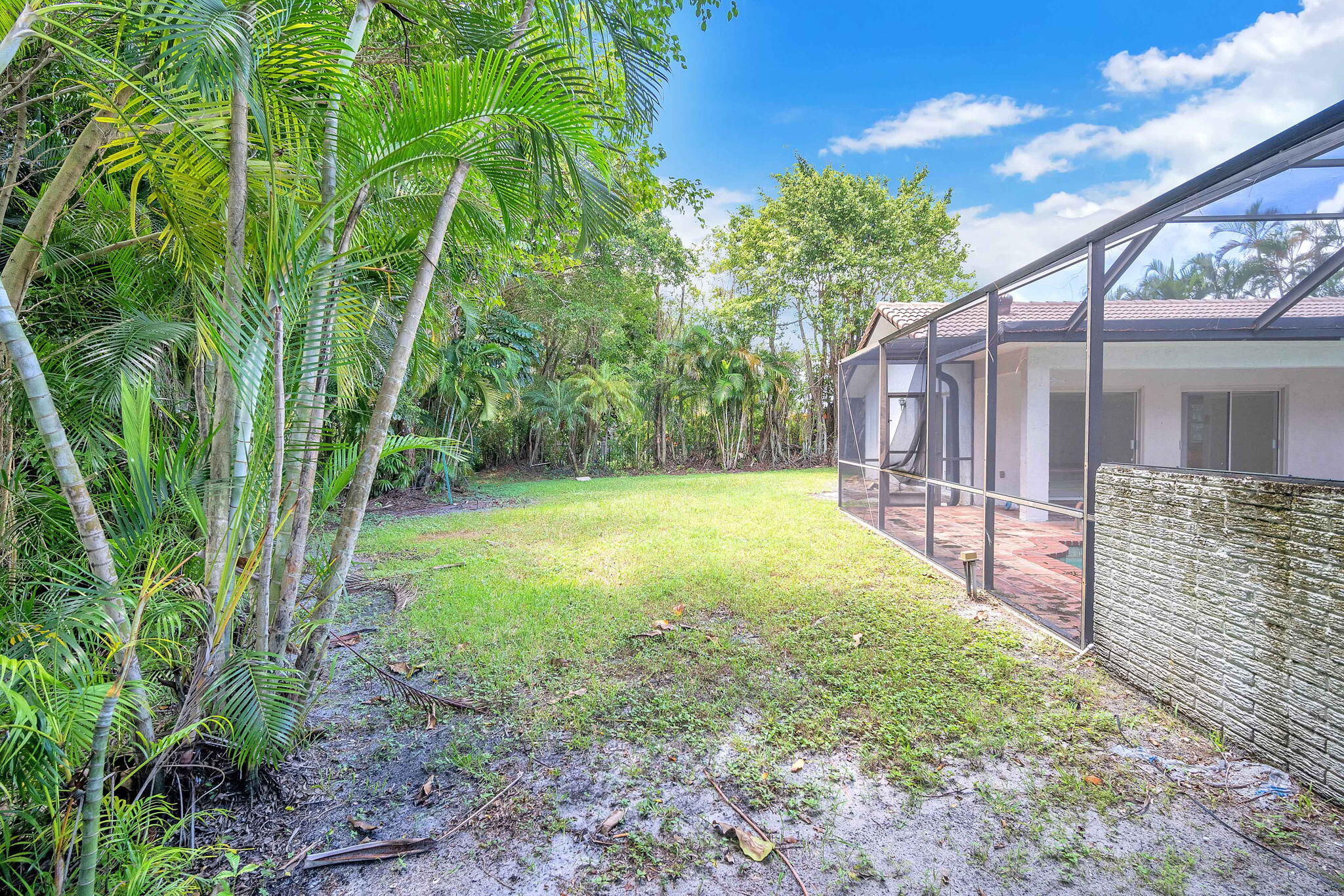 6794 Giralda Circle Boca Raton, FL 33433 - Photo 44 of 49 a view of a backyard with a garden