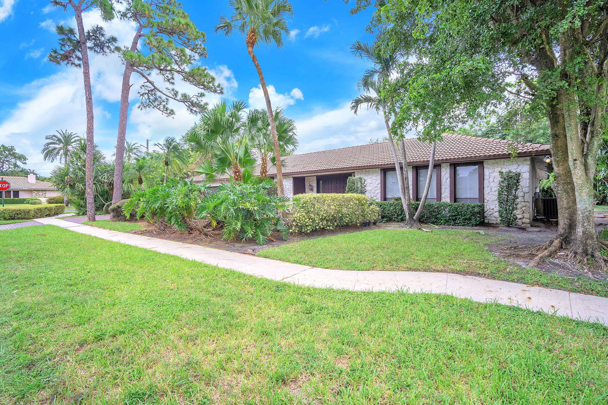 6794 Giralda Circle Boca Raton, FL 33433 - Photo 5 of 49 a view of a house with a big yard plants and large trees