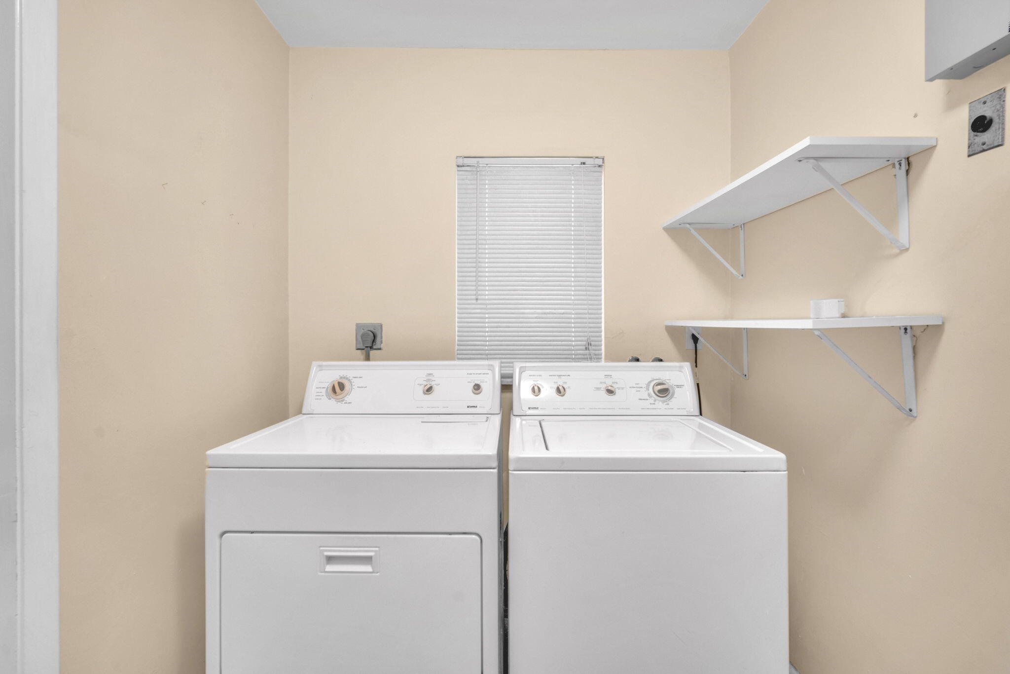 6794 Giralda Circle Boca Raton, FL 33433 - Photo 10 of 49 a utility room with dryer and washer