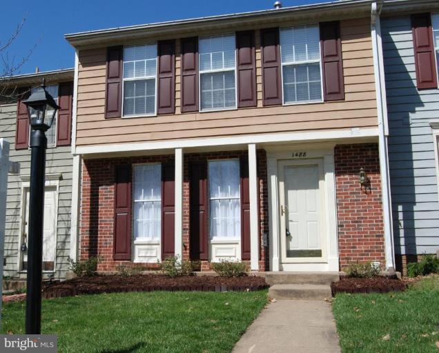 1488 Autumn Ridge Circle Reston, VA 20194 - Photo 1 of 30 a front view of a house
