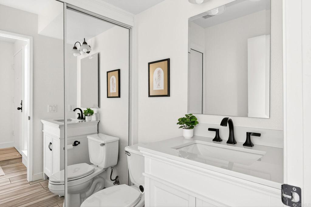 3784 Pershing Avenue, Unit 2 San Diego, CA 92104 - Photo 14 of 25 Lower level half bath. Has laundry hook ups here for stackable washer/dryer