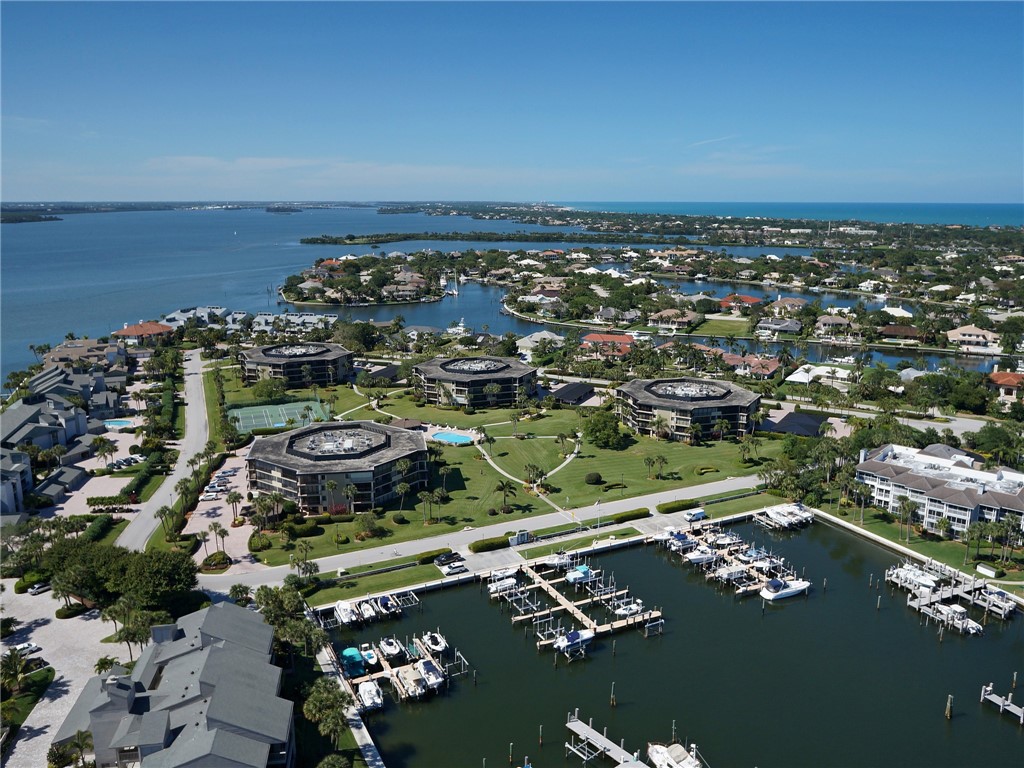 an aerial view of a residential building with outdoor space