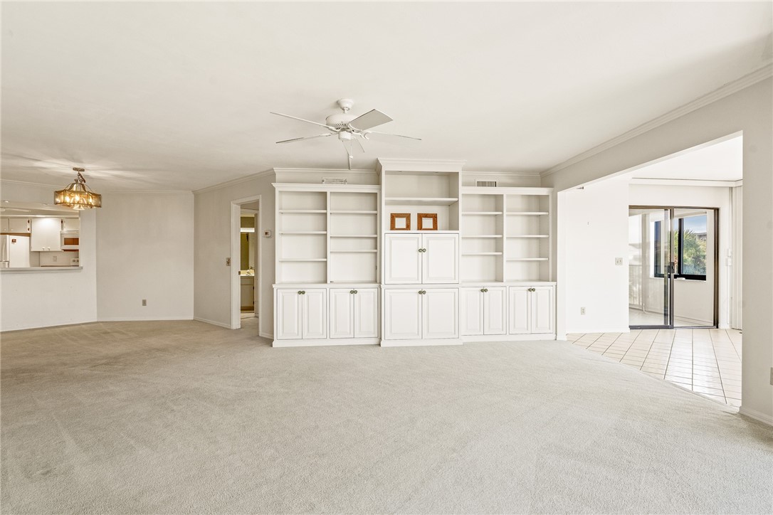 1850 Bay Road, Unit 3F Vero Beach, FL 32963 - Photo 7 of 34 an empty room with windows and pillars in it