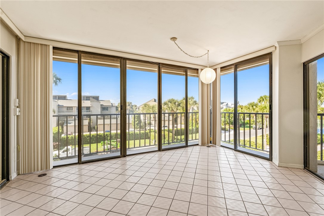 1850 Bay Road, Unit 3F Vero Beach, FL 32963 - Photo 9 of 34 a view of an empty room and window