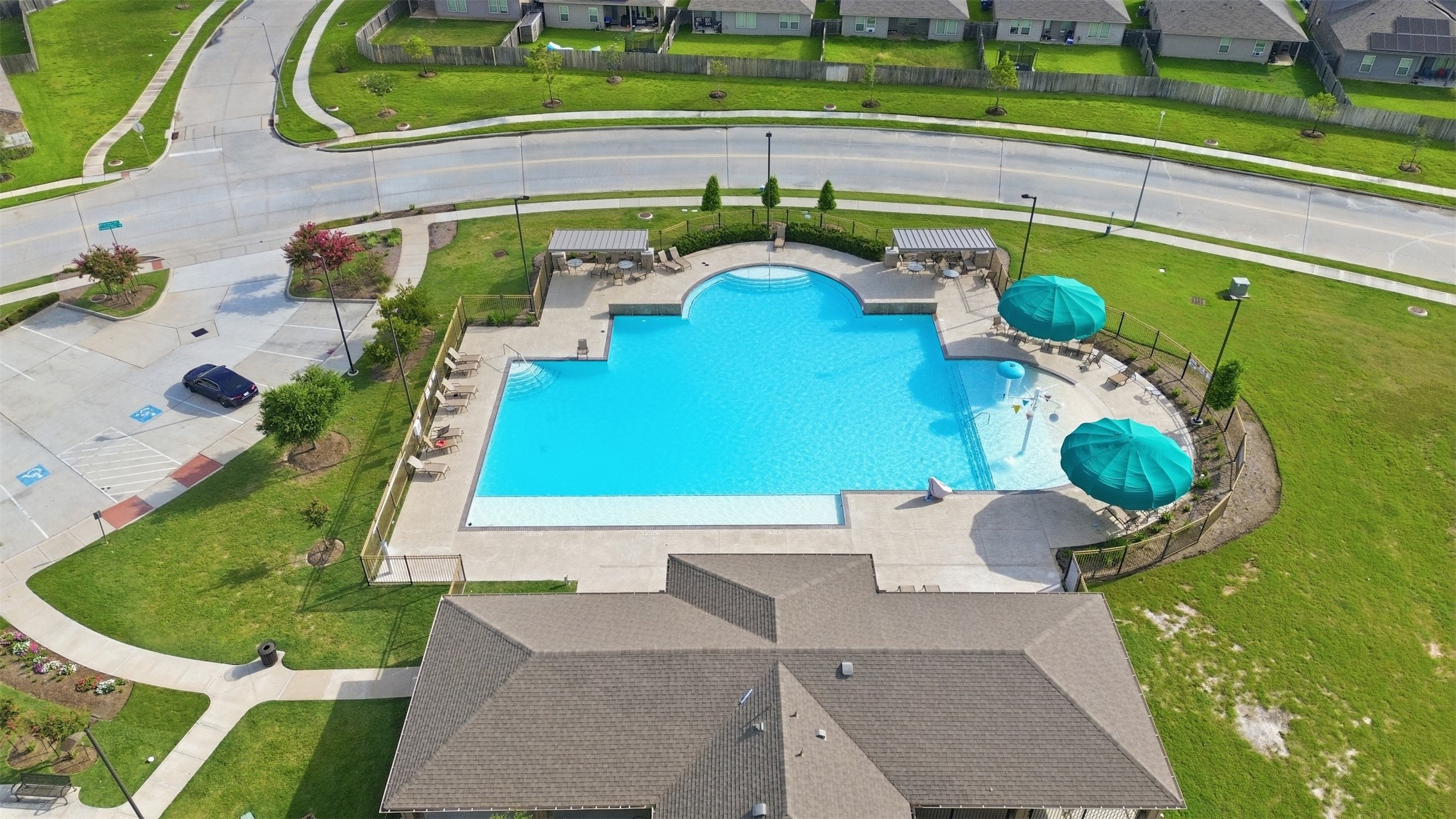 2346 Gold Forsythia Ln Spring Spring, TX 77373 - Photo 36 of 39 Relax and unwind at the stunning Breckenridge West community pool, featuring expansive lounging areas and modern amenities.