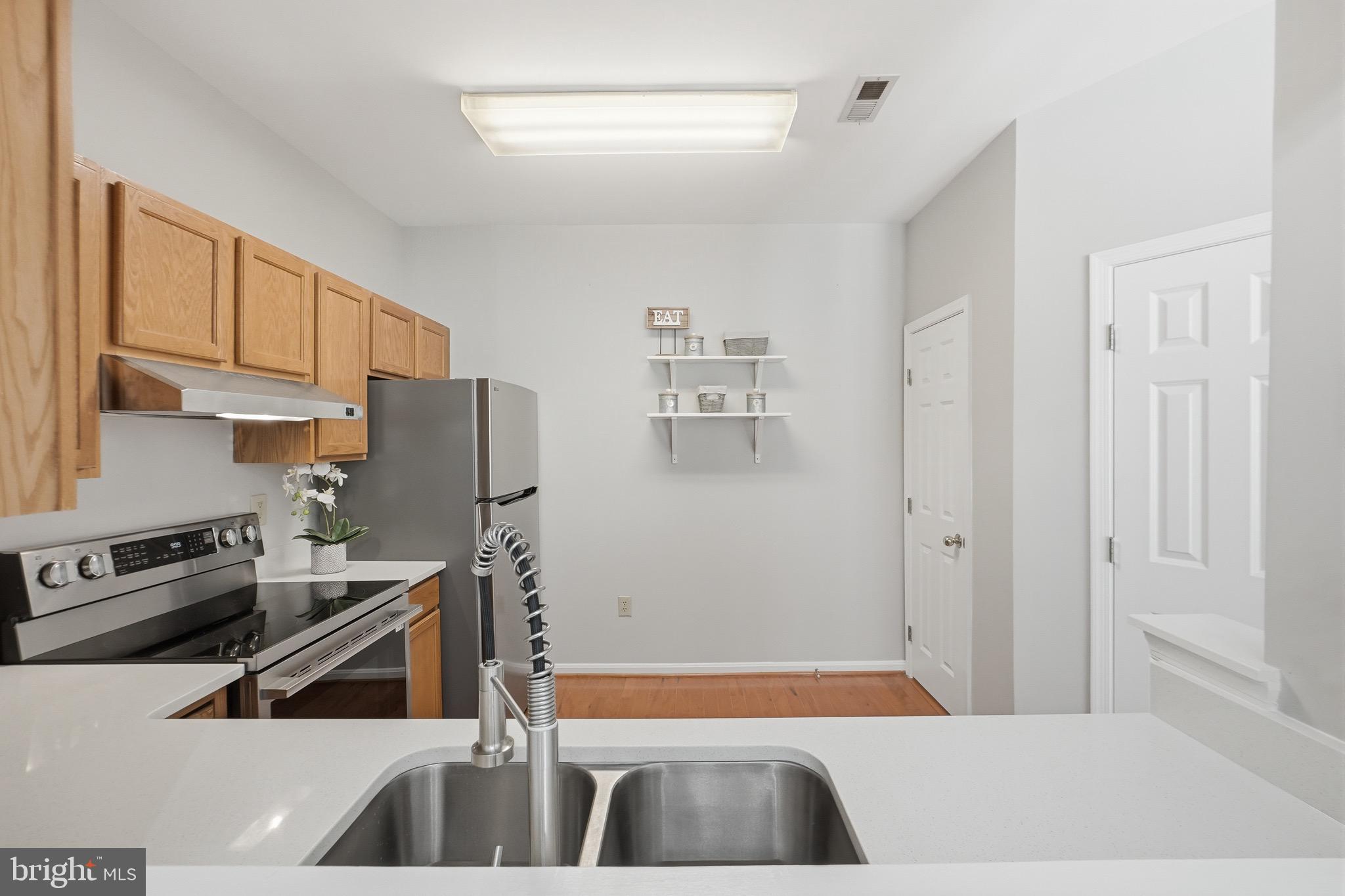 2002 Bell Point Court Odenton, MD 21113 - Photo 4 of 30 Brand NEW quartz countertops!