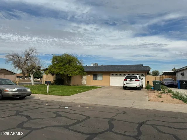 a view of street with parked cars
