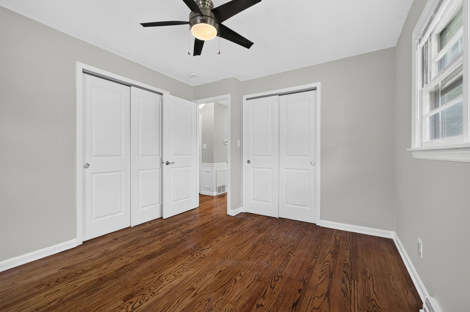 415 Alma Terrace Cary, IL 60013 - Photo 13 of 23 a view of empty room with wooden floor