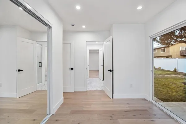 a bathroom with a double vanity sink mirror and
