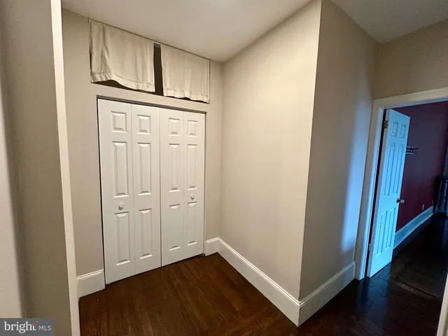 a view of front door with hallway