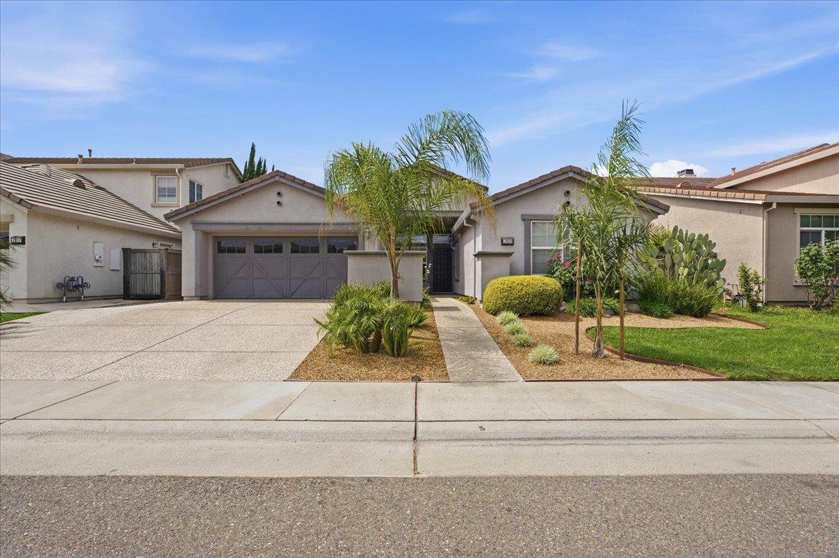 7821 Shell Beach Drive Antelope, CA 95843 - Photo 1 of 40 a front view of house with yard and green space