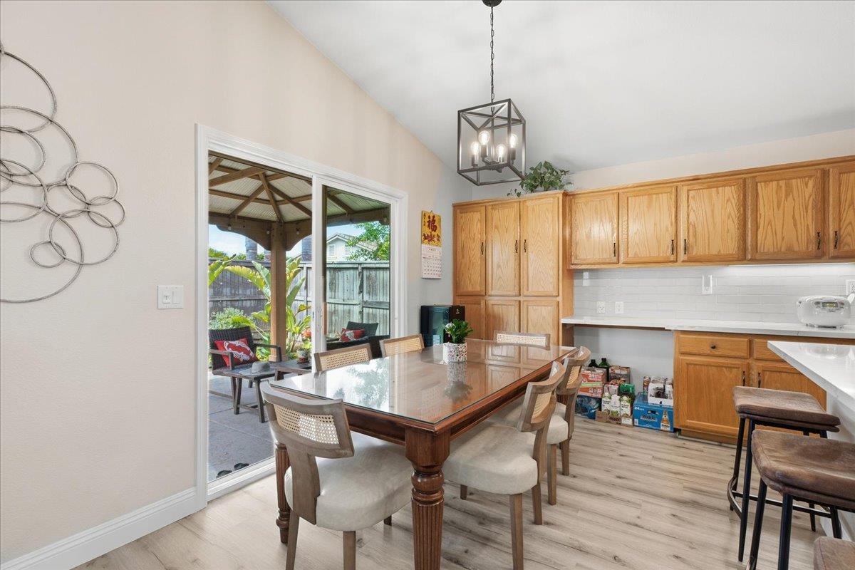 7821 Shell Beach Drive Antelope, CA 95843 - Photo 18 of 40 a view of a dining room with furniture window and outside view